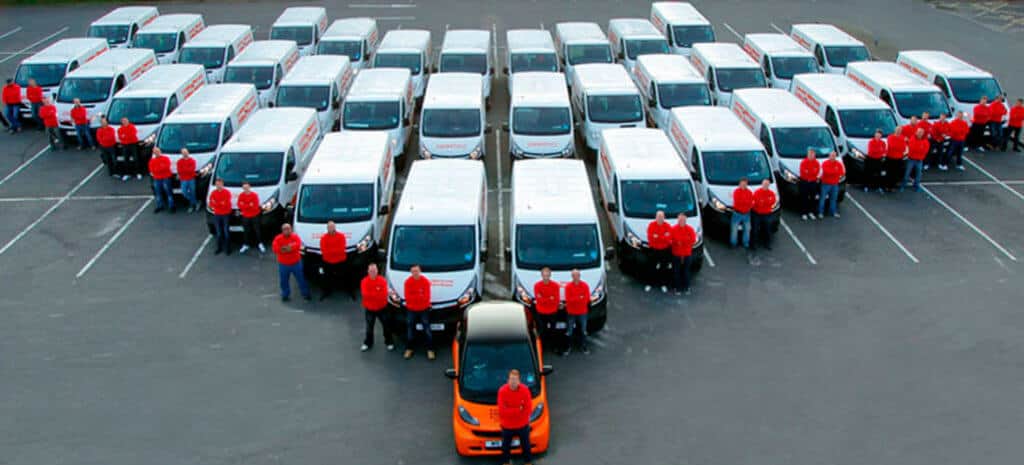 Aerial image of London Diamond Drilling company in front of the work fleet vans